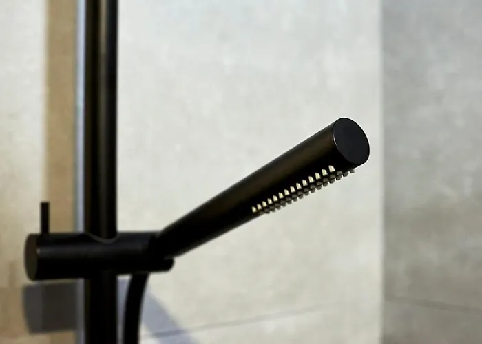 In The Center Of Next To The *