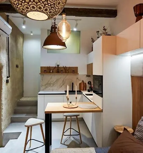 In The Center Of Next To The *